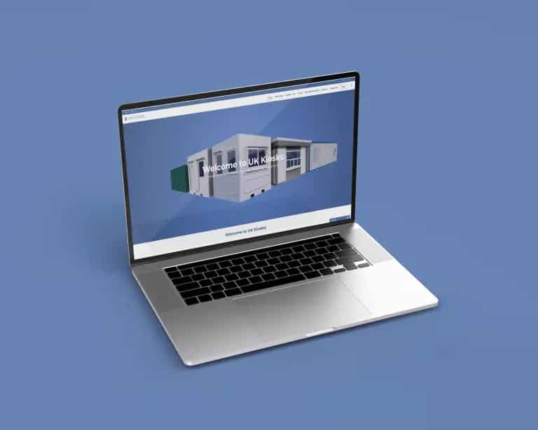 Macbook laptop presenting home page of UK Kiosks' website
